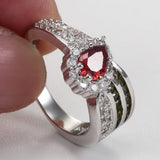 Ruby-Red Pear CZ Halo Crossover Ring