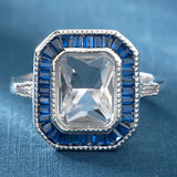 Cushion CZ Blue Baguette Halo Ring