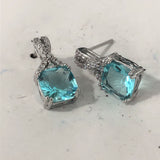 Emerald-Green Square CZ Twist Drop Earrings