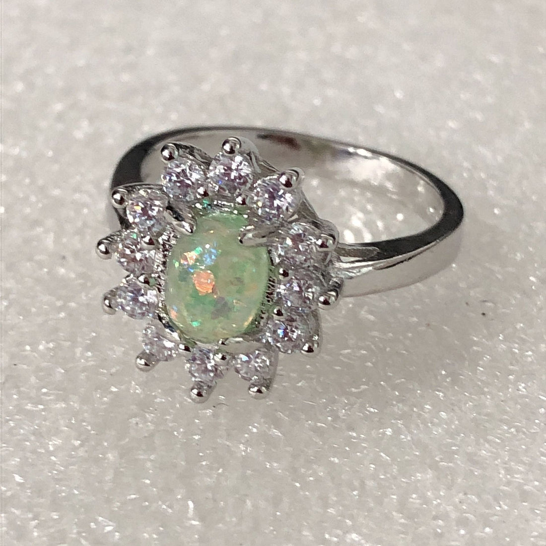 Opal-Look Oval CZ Flower Halo Ring