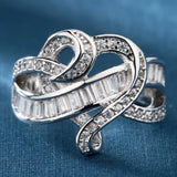 Pave Baguette CZ Swirl Crossover Ring