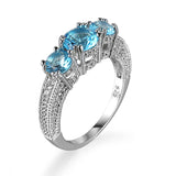 Emerald-Green Round CZ Three-Stone Pave Ring