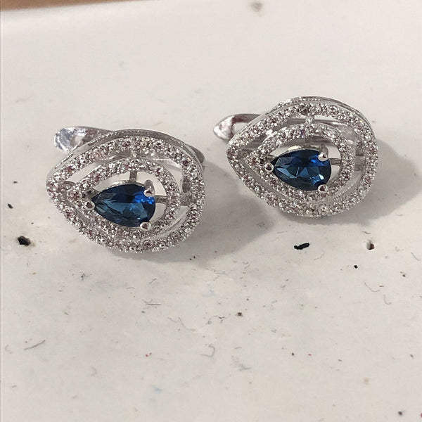Sapphire-Blue Pear CZ Swirl Halo Earrings