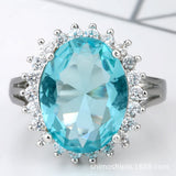 Aqua Oval CZ Sunburst Halo Ring
