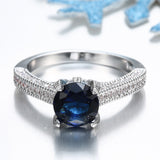 Sapphire-Blue Round CZ Pavé Solitaire Ring