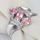 Pink Oval CZ Three-Stone Diagonal Ring