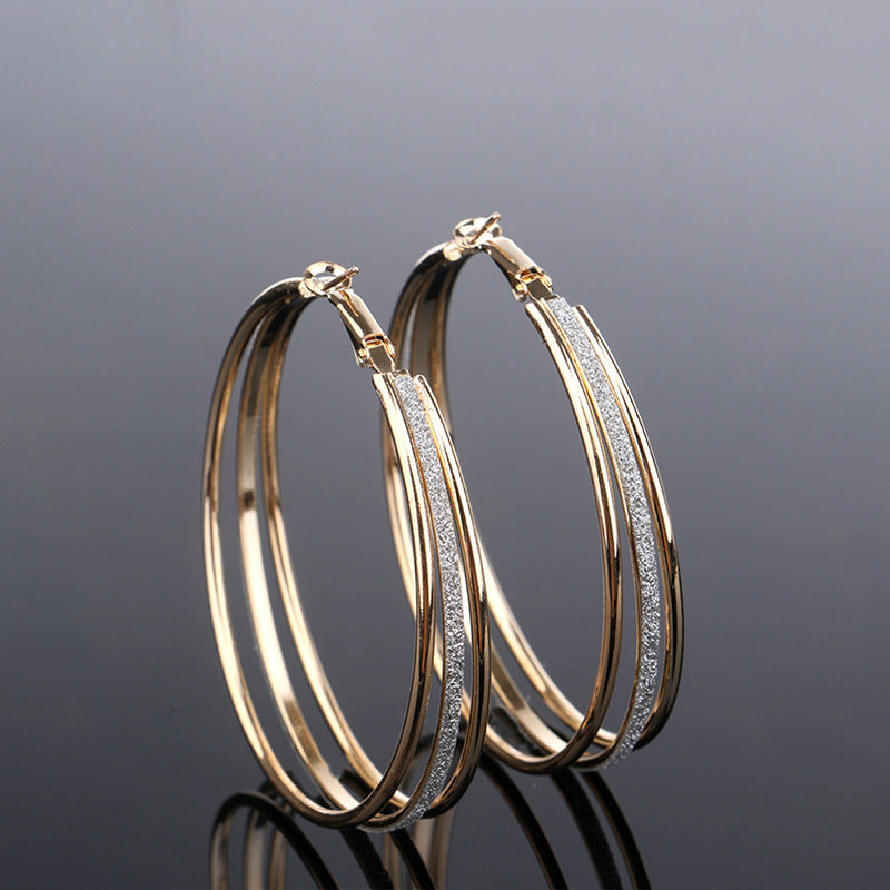 Gold Triple-Row Glitter Oval Hoop Earrings