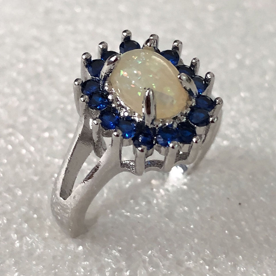 Opal-Look Oval Sapphire-Blue CZ Halo Ring