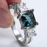 Teal Square CZ Three-Stone Ring