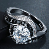 Round CZ Solitaire Black Channel Swirl Ring