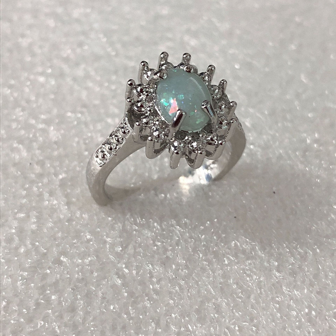 Opal-Look Oval CZ Sunburst Halo Ring