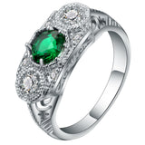 Emerald-Green Oval CZ Three-Stone Engraved Ring