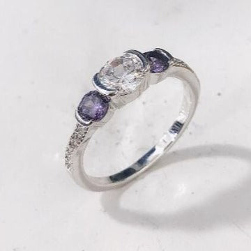 Clear and Purple Oval CZ Three-Stone Ring