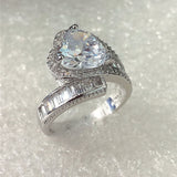 Pear CZ Bypass Ring with Baguette Shoulder