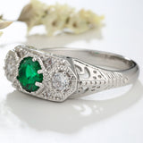Emerald-Green Oval CZ Three-Stone Engraved Ring