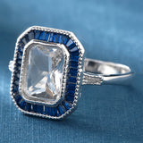 Cushion CZ Blue Baguette Halo Ring