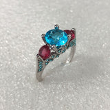 Aqua and Red CZ Three-Stone Ring